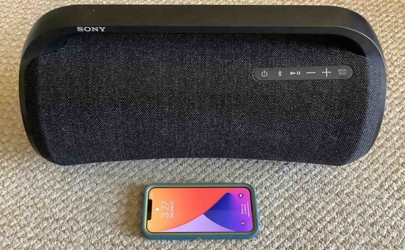 Picture of the Sony SRS XG500 boombox speaker along with an iPhone.