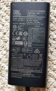 Picture of the embossed specs side of the charger box.