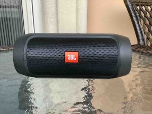 Picture of the front of the JBL Charge 2 Plus speaker. Battery Capacity mAh.
