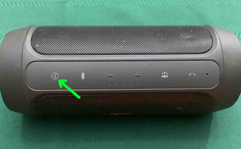 Picture of the Power button on the JBL Charge 2 Plus Bluetooth speaker.