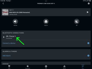 Screenshot of the JBL Charge 5 speaker connected to an Echo Dot 4 on the device specific settings page in the Alexa app on iPadOS.