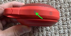Picture of the Pairing button on the JBL Clip speaker.