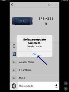 Screenshot of the Sony Music Center app on iPadOS, displaying the Software 4800 update on the SRS XB33 speaker is complete, with the OK button highlighted.