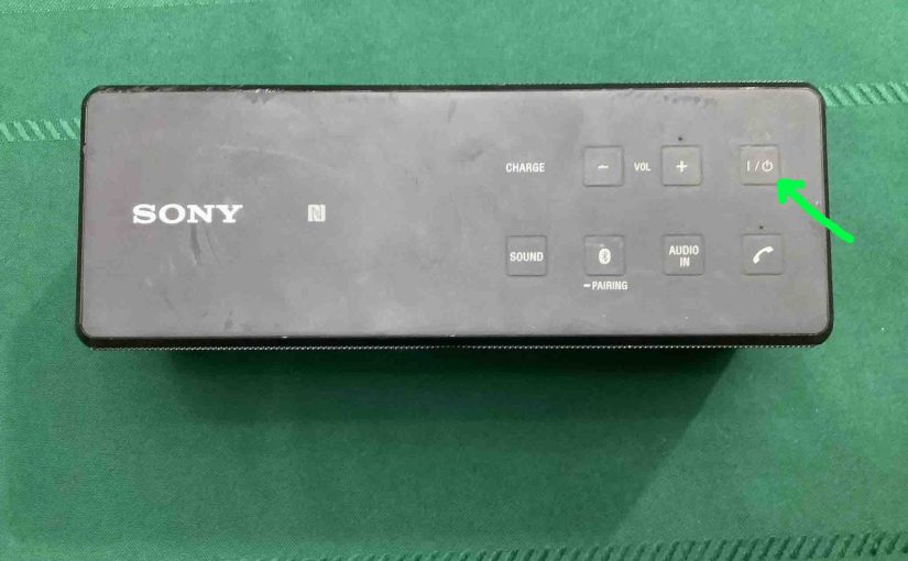 Picture of the Power button on the Sony SRS X3 speaker.