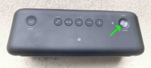 Picture of the Power-Pairing button location on the speaker.