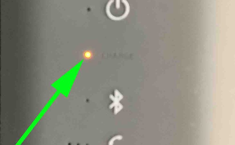 Picture of the orange glowing CHARGE indicator light on the Sony SRS XE200 speaker.