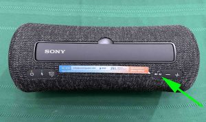 Picture of the Play-Pause-Call button on the Sony SRS XG300 speaker.