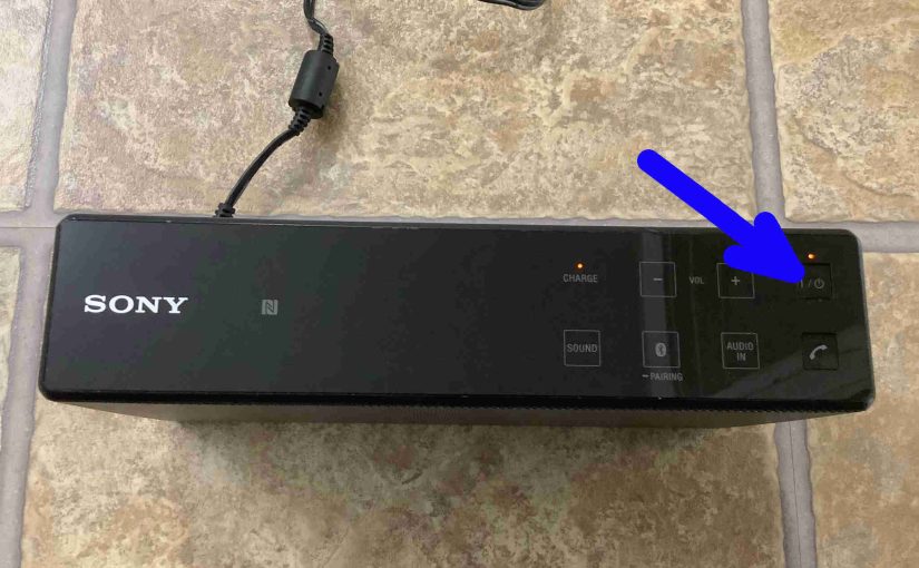 Picture of the Power button on the top of the Sony SRS X5.