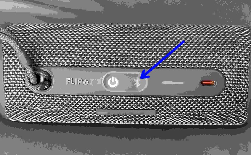 Picture of the dark -Bluetooth- button on the JBL Flip 6.